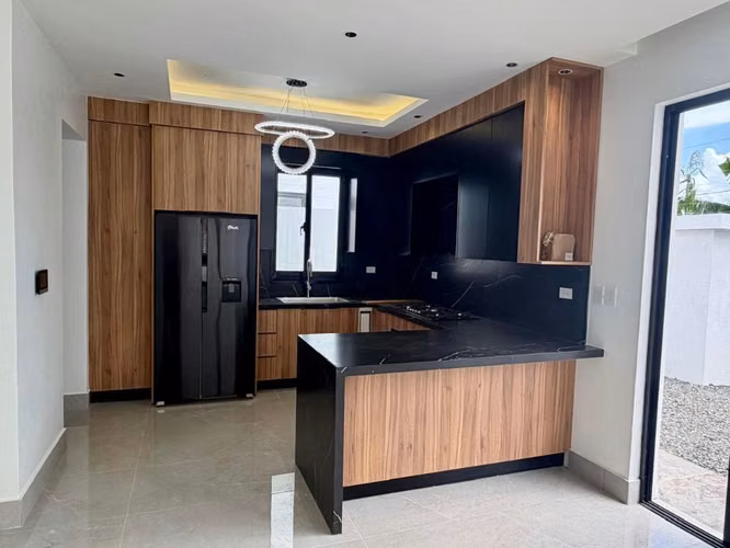 CASA EN VENTA DE DOS NIVELES EN PUÑAL, SANTIAGO. - Imagen 3