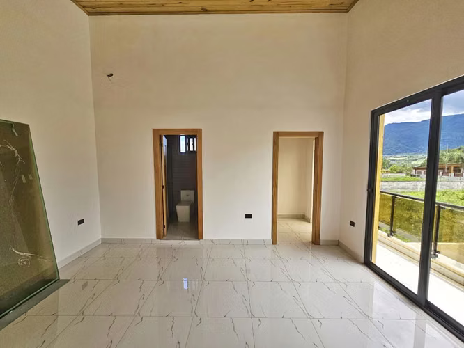 Villa nueva a estrenar en venta en jarabacoa cerca del pueblo a paso del rio camu