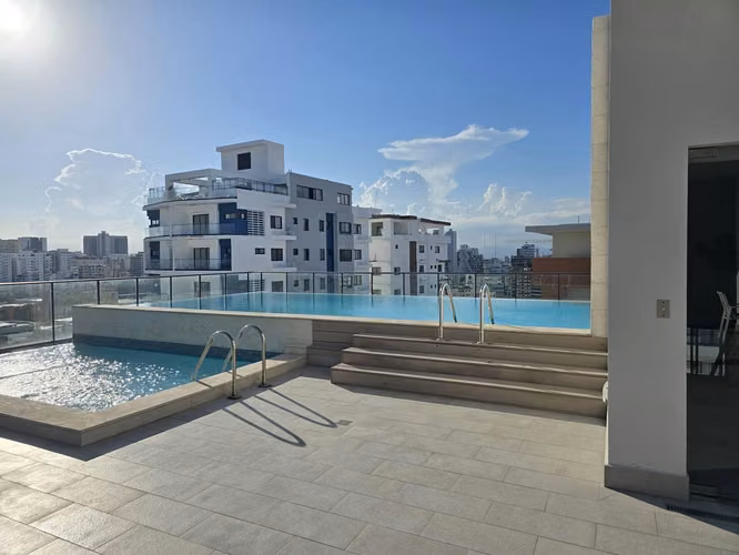 Apartamento en venta de 1 habitación en Naco l con línea blanca - Imagen 7