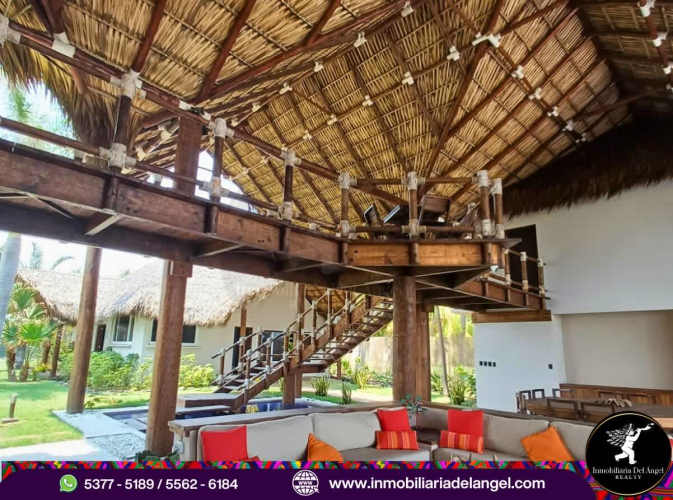 Luxury beachfront home with infinity pool & jacuzzi.