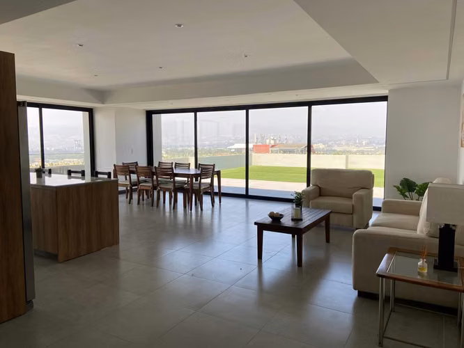 Apartamento Amueblado en Edificio Elemento zona 13 | Con Terraza y 2 Habitaciones