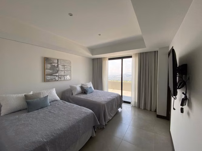 Apartamento Amueblado en Edificio Elemento zona 13 | Con Terraza y 2 Habitaciones - Imagen 4
