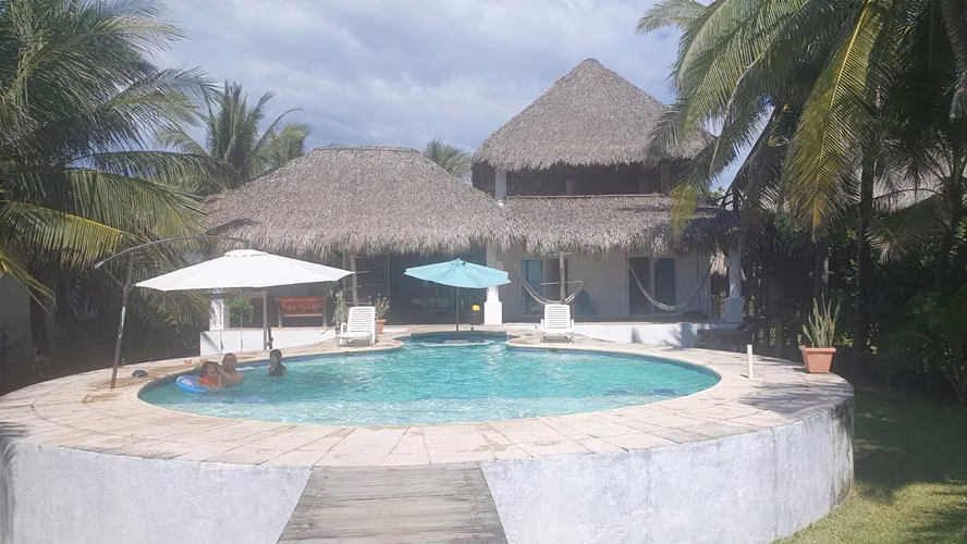 Casa de playa frente al mar establecida para renta