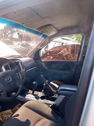 Repuestos de mazda tribute 2005