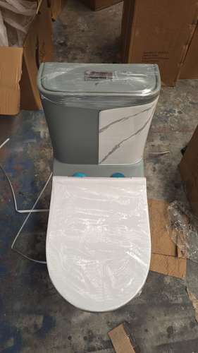 INODORO DE PORCELANA DE UNA PIEZA GRIS CON BLANCO