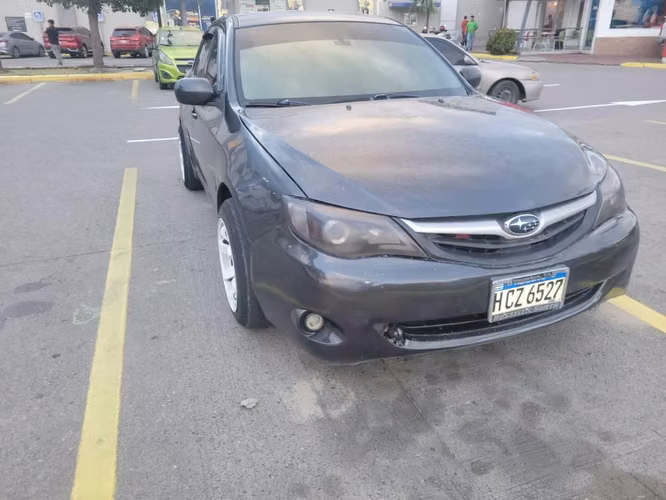 Vendo Turismo Subaru Impreza Año 2011 Mecánico 6 cambios más retroceso Aire Acondicionado   Llamadas al   Disponible en San pedro sula   Lps.93mil negociable - Imagen 3