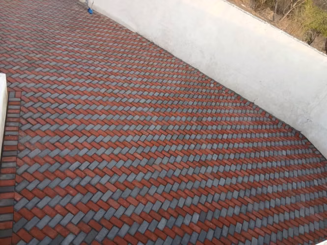 Suministro e instalación de adoquín rectangular de 10x20x6cm
