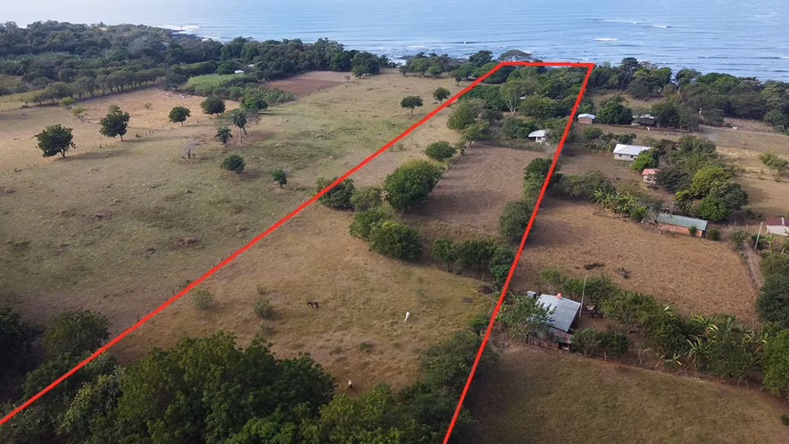 Beachfront, 6 acres titled property with small house.