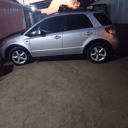 Suzuki SX4 2008 gris plateado — económico, AC al 100%, documentos en regla | $6,300 negociable