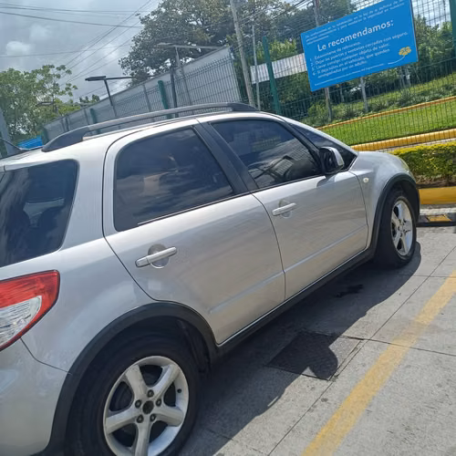 Suzuki SX4 2008 gris plateado — económico, AC al 100%, documentos en regla | $6,300 negociable