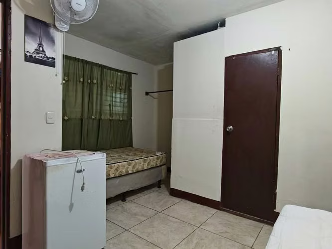 Persona extra para habitación compartida