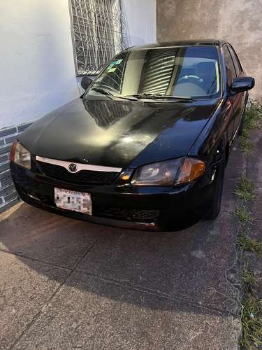 MAZDA 1999 AUTOMÁTICO EN VENTA – COLOR NEGRO    Precio: $3,500 USD  Vendo Mazda año 1999, color negro, transmisió