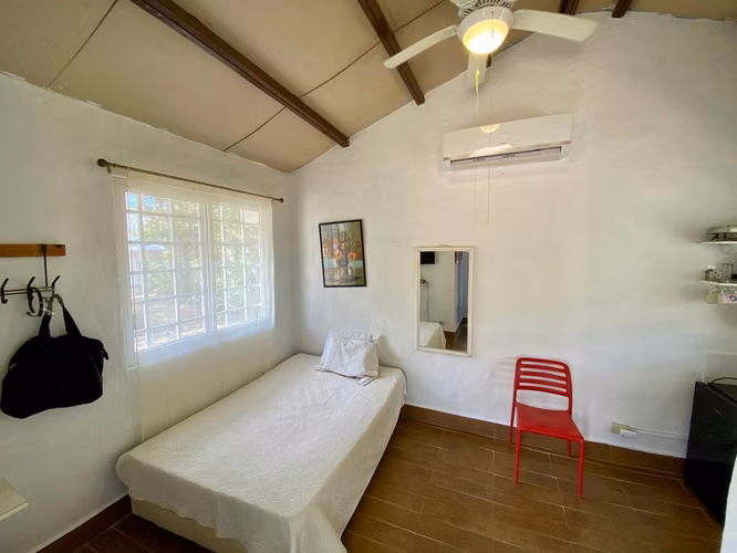 TERRENO CON CABAÑAS LAS UVAS CAMINO A EL VALLE EN VENTA