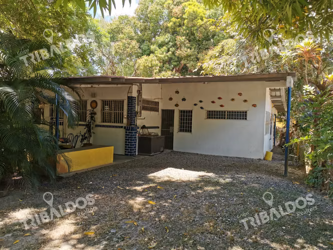 TERRENO CON CASA EN SANTA CLARA