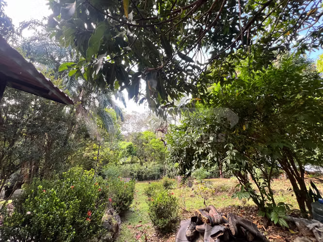 Venta de terreno con casa frente al Río Pacora, Vía hacia San Miguel