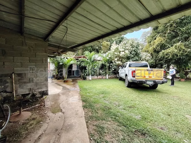VENTA TERRENO CON CASAS PARA COMERCIO CAPIRA