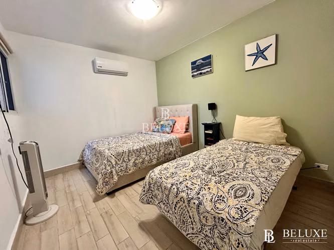 VENTA DE APARTAMENTO AMOBLADO A PASOS DEL MAR, PLAYA CARACOL (26)