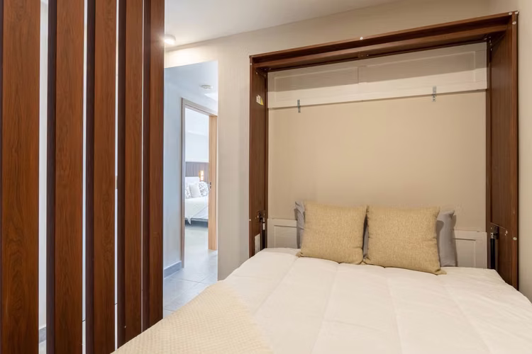 LIVE YOUR BEST LIFE AT THE PALMS 1 BED PLUS FLEX ROOM. OCEAN VIEWS