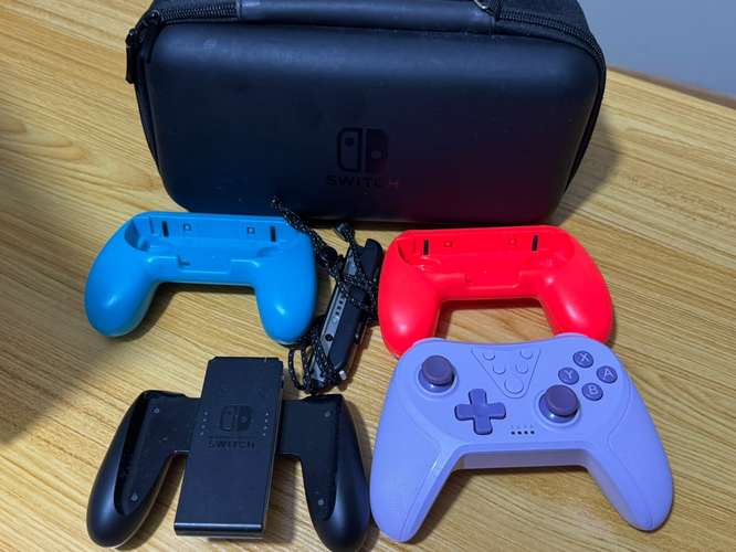 NEGOCIABLE - Se vende Nintendo Switch Olded + 2 juegos + accesorios - Imagen 2