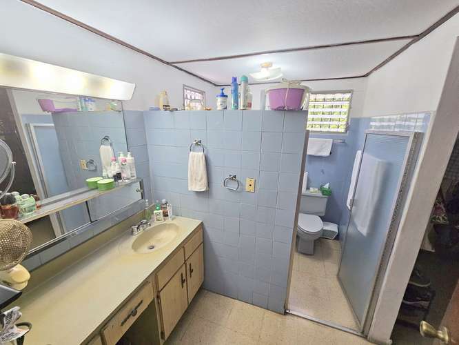 Venta de Casa en Esquina con Enorme Patio en Altos de La Loma - Pueblo Nuevo. Precio Negociable