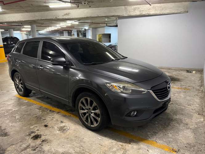 Se vende Mazda CX-9 AWD, color gris oscuro, SUV espaciosa, cómoda y elegante, ideal para uso familiar o diario.