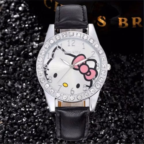 Reloj nuevo dorado y de piel Hello Kitty  $35  c/u