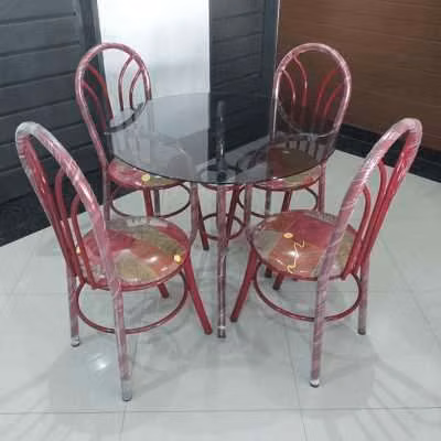 Juego de comedor 4 sillas con mesa de vidrio redonda