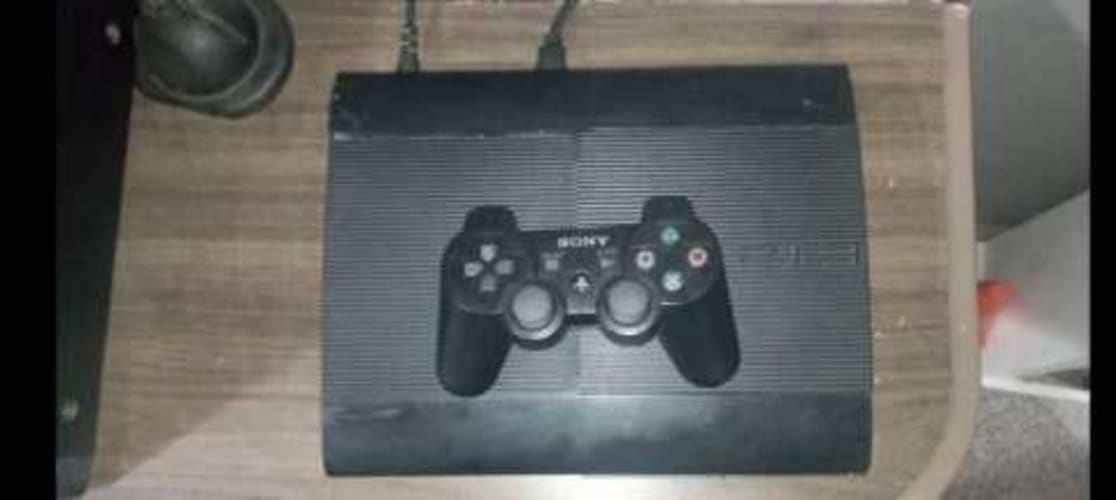 PS3 Super Slim with 9 games and 1 control