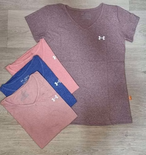 Remera cuello v Under jaspeado para dama