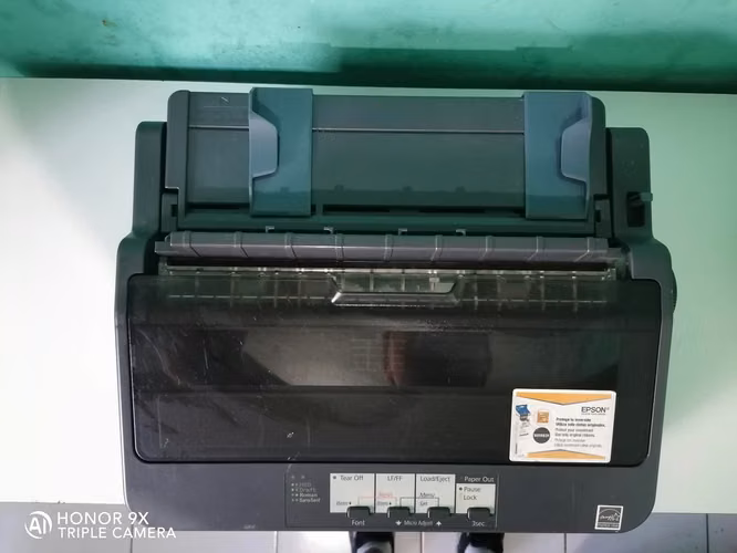 Impresora EPSON LX350 matricial con su cinta y cable de poder $275
