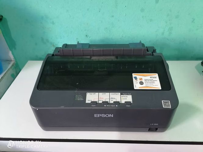 Impresora EPSON LX350 matricial con su cinta y cable de poder $275