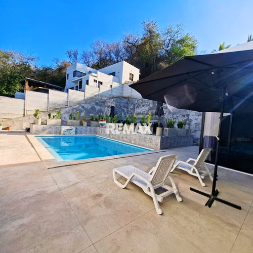 VENTA  CASA ATAMY $ 640.000 MIL/AMUEBLADA/ SURF CITY 1 RESIDENCIAL  primera FILA LA LIBERTAD