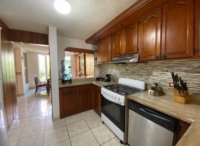 Bella casa en condominio