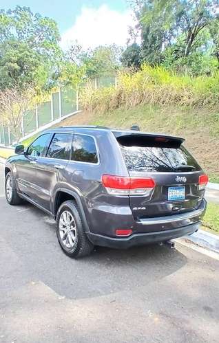 Jeep Grand Cherokee 2015, Limited 4x4, Full Cuero, 290 HP, 103mil Millas, Detalles botón