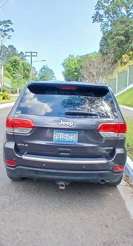 Jeep Grand Cherokee 2015, Limited 4x4, Full Cuero, 290 HP, 103mil Millas, Detalles botón