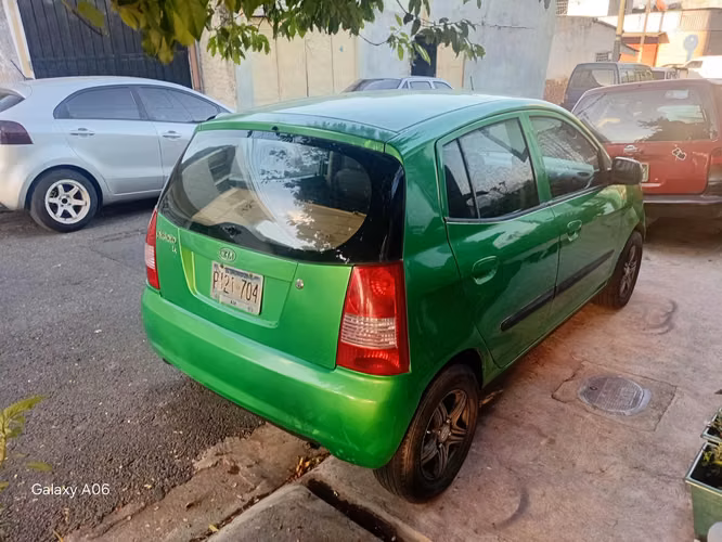 KIA PICANTO 2005  Standard de Agencia  4 puertas  Motor 1.1 Super Económico  Rines Especiales  Llantas Nuevas. - Imagen 13