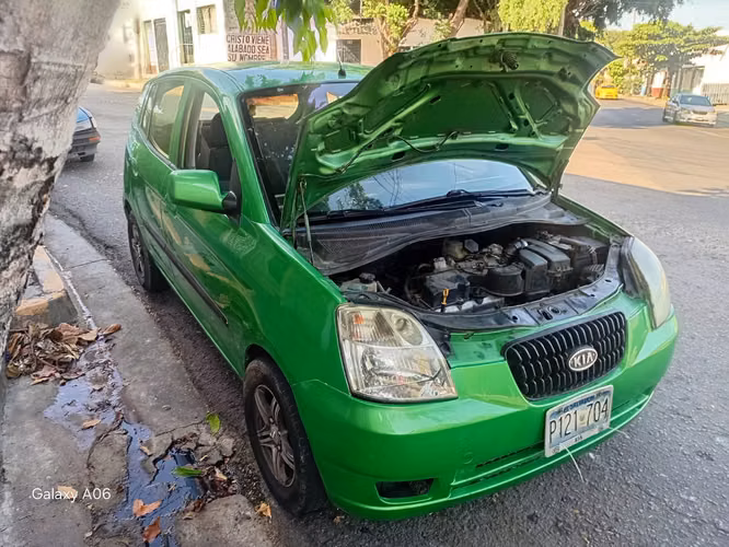 KIA PICANTO 2005  Standard de Agencia  4 puertas  Motor 1.1 Super Económico  Rines Especiales  Llantas Nuevas. - Imagen 14