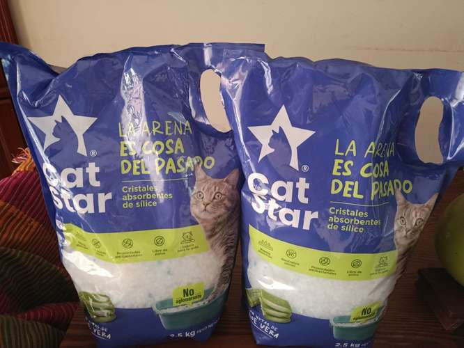 Arenad aglomerantes y cristales para caja de gato 