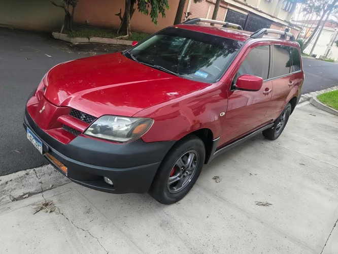 MITSUBISHI OUTLANDER 2003  4X4 Automática  Traspaso Directo 4 cilindros Caja ATF A/C Rines
