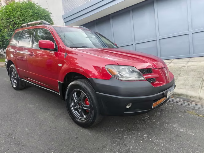 MITSUBISHI OUTLANDER 2003  4X4 Automática  Traspaso Directo 4 cilindros Caja ATF A/C Rines