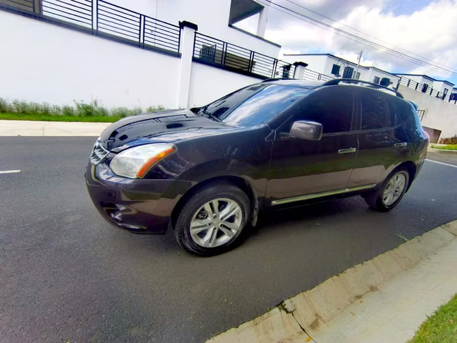 NISSAN ROGUE 2012  Automática 99 Míl Millas  Traspaso Directo   Motor, Caja y Suspensión Buenas  A/C  - Imagen 13
