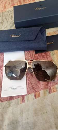 Chopard lentes de sol polarizados nuevos en su caja y papeles ferragamo gucci prada Louis vuitton rolex omega cartier 