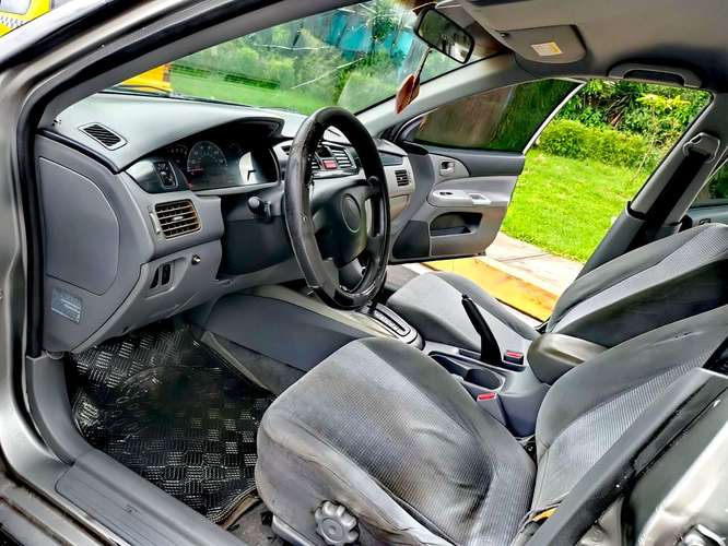 MITSUBISHI LANCER 2004 Traspaso Directo  4 puertas  Caja automática ATF Aire Acondicionado