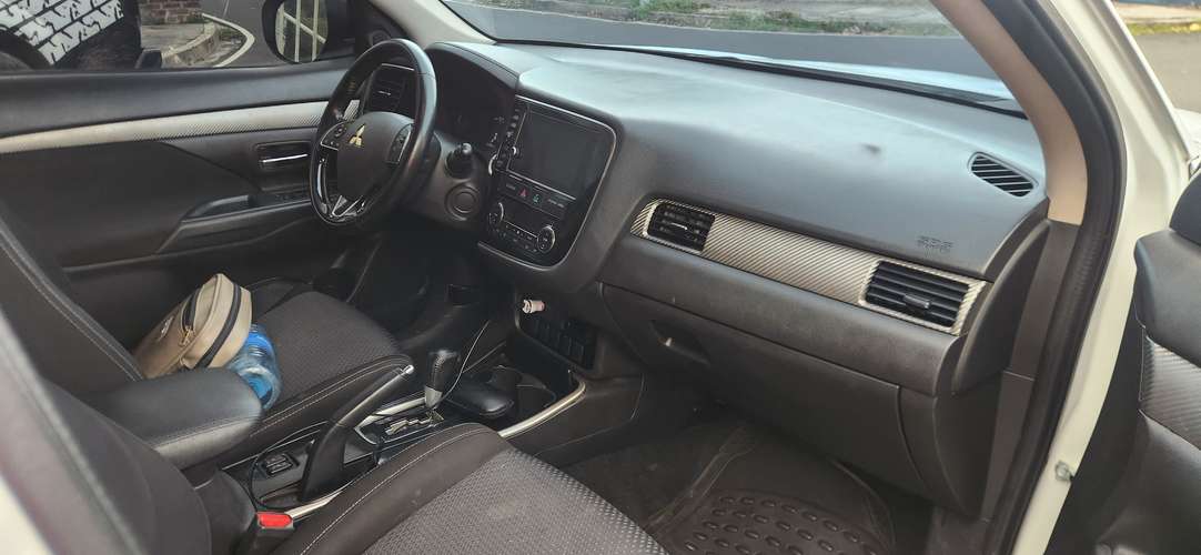 Mitsubishi outlander 2017 autom bb ac rines cámara 3 filas vids-elect nitida acepto auto a cuenta 