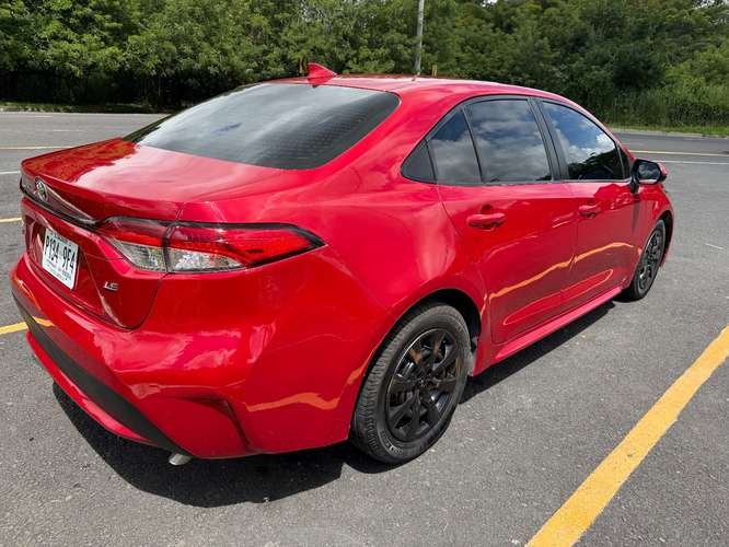 HERMOSO TOYOTA COROLLA 2021 LE BOLSAS FRONTALES BUENAS COLOR ROJO CANDY - Imagen 5