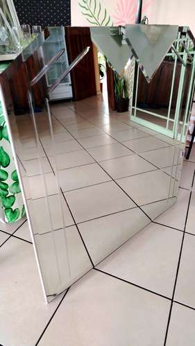 Espejo decorativo biselado con lámpara incorporada
