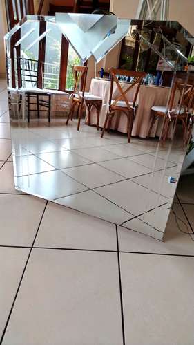 Espejo decorativo biselado con lámpara incorporada