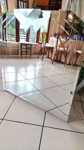 Espejo decorativo biselado con lámpara incorporada